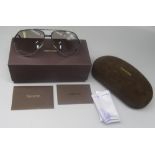 Pair of Tom Ford sunglasses with grey tint lenses, in brown suede type case case with unopened wipe,