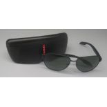 Pair of Prada sunglasses in black case