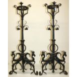 The Lizzie Cundy Collection - Pair 19th Century style wrought iron fire dogs, with integrated candle
