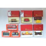 Collection of boxed Rivarossi HO gauge goods wagons including log transporter, Flat Car, Caboose etc