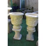 pair of garden planters with floral and leaf design on plinth H83cm (2)