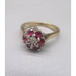9ct yellow gold diamond and ruby cluster ring, stamped 375, size M, 3.0g