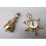 Two 9ct yellow gold charms including a lighthouse and a ships wheel compass, both stamped 375, 13.5g