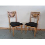 Pair of modern Biedermier style salon chairs, curved pierced backs and serpentine seats on angular