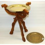 Late C20th Indian side table modelled as three camels, with inset brass charger top, H55cm, and an