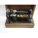 Cased Singer sewing machine