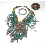 Tibetan white metal necklace set with turquoise and coloured beads, a similar bracelet and a jade