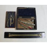 Military brass map rule by WH Harling of London 1916 and a set of compass' and scribes (2)