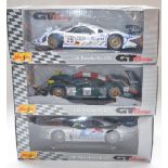Three 1/18 scale diecast Maisto GT Racing car models to include 2x Porsche 911 GT1's and a