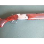 12B Beretta over under shotgun with 28" barrels, overall length 46", serial number: L62442B (shotgun