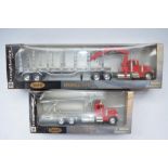 Two boxed large 1/32 scale diecast and plastic truck models by New Ray, part of their Long Hauler