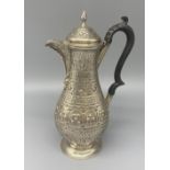 Victorian hallmarked Sterling silver coffee pot with Middle Eastern style design and twisted finial,