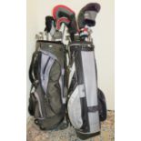 Quantity of modern golf clubs and putters in two carry bags