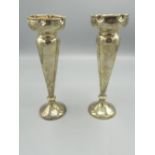 Pair of Edward VII silver specimen vases of trumpet design H18.5cm, weighted bases, makers mark