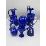 Pair of late Victorian Bristol Blue conical design jugs with clear handles decorated with enamels