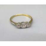 Yellow gold and platinum three stone diamond ring, stamped ?ct & pt, size O 1/2, 1.9g