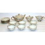 Bavarian type porcelain tea ware with silver overlay, comprising teapot, H11cm, six cups and