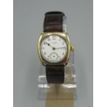 Waltham rolled gold hand wound wristwatch, signed white enamel dial with red 12, outer minute