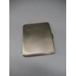 ER.II hallmarked Sterling silver cigarette case with engine turned detail and gilded interior, by