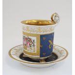 C19th French Paris porcelain coffee can and saucer, the cup with scrolled handle terminating in