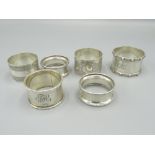 Pair of George V Silver napkin rings Birmingham 1921 and four other silver napkin rings Birmingham