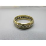 18ct yellow gold eternity ring set with clear stones, stamped 18, size L, 3.5g