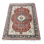 Persian pattern multicoloured wool rug, triple shaped medallion floral field in multi repeat striped