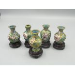 Five miniature Chinese cloisonne vases on hardwood bases, H5cm