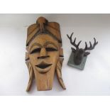 Crissy Rock Collection - Carved hardwood Eastern wall mask H50cm and a cast iron deer mask coat hook