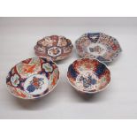 Japanese Meiji period octagonal Imari pattern charger and three similar bowls
