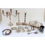 Pair of C19th silver plated candlesticks with removable sconces above knopped stem on quatrefoil