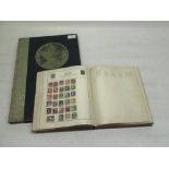 Strand stamp album containing postally used world stamps including the French colony's French post
