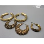 pair of 9ct yellow gold large hoop earrings, stamped 375, a pair of ornate 9ct yellow gold hoop