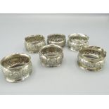 Pair of Edward VII silver napkin rings with central rapusay band makers mark Henry Williamson Ltd, a