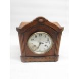 H.A.C C20th oak cased chiming mantle clock, silvered dial with makers logo striking on a scroll