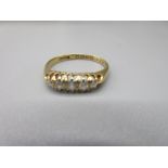 18ct yellow gold five stone diamond ring, stamped 18, size M1/2, 2.2g