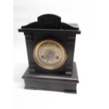 H.A.C. C20th ebonised mantle clock with brass dial, 2 train movement striking on a scroll gong,