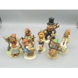 Goebel figure of a chimney sweep impressed No104012 H14cm and six smaller Goebel figures