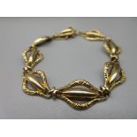 9ct yellow gold ornate link bracelet with box clasp and safety chain, stamped 9ct, 9.7g