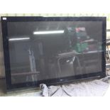 Large LG 60PG7000 flat screen TV, with remote control