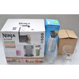 Ninja Blender, 1000W with 700ml Triton cup, as new, box factory sealed. Also included a Soda