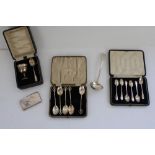 Hallmarked silver card case, ladle, egg and spoon set, six coffee spoon set and one other coffee