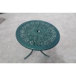 Cast metal circular garden table with floral piercing design, W68cm H65cm