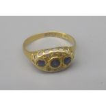 18ct yellow gold diamond and blue stone gypsy ring, stamped 18, size O 1/2, 1.9g