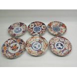 Six Japanese Meiji period Imari pattern plates, average D21cm