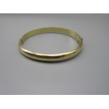 14ct yellow gold plain bangle, with box clasp, stamped 585, 12.0g
