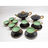 Marius Giuge Vallauris 14 piece Art Deco style tea service, black glaze with gilt highlights with