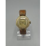 Swiss early C20th 14K gold hand wound wristwatch, gold coloured dial set with Roman numerals, bright