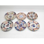 Six Japanese Meiji period Imari pattern plates