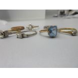 Three 9ct yellow gold rings, including one solitaire ring with illusion set diamond, gross 6.8g, two